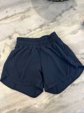 Lululemon High Rise Running 4” shorts - size 4 - navy